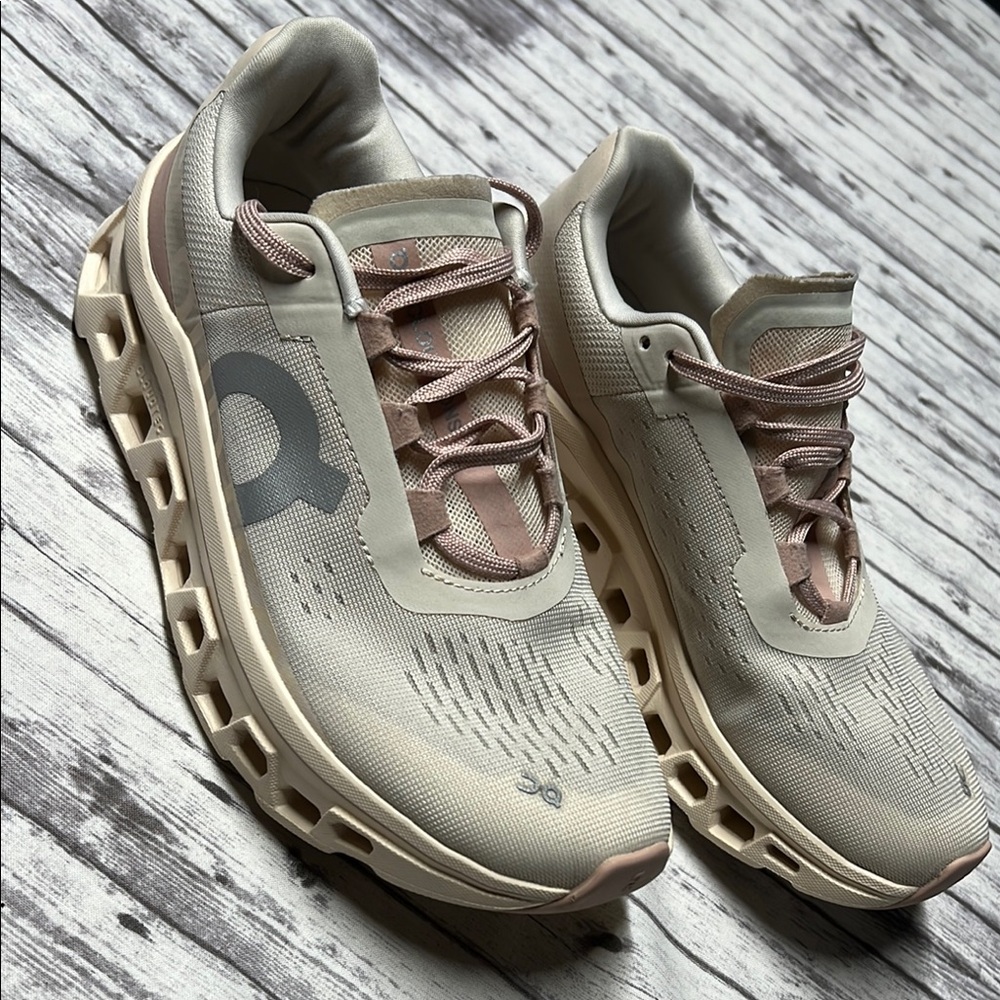 On Running Cream and Gray Sneakers